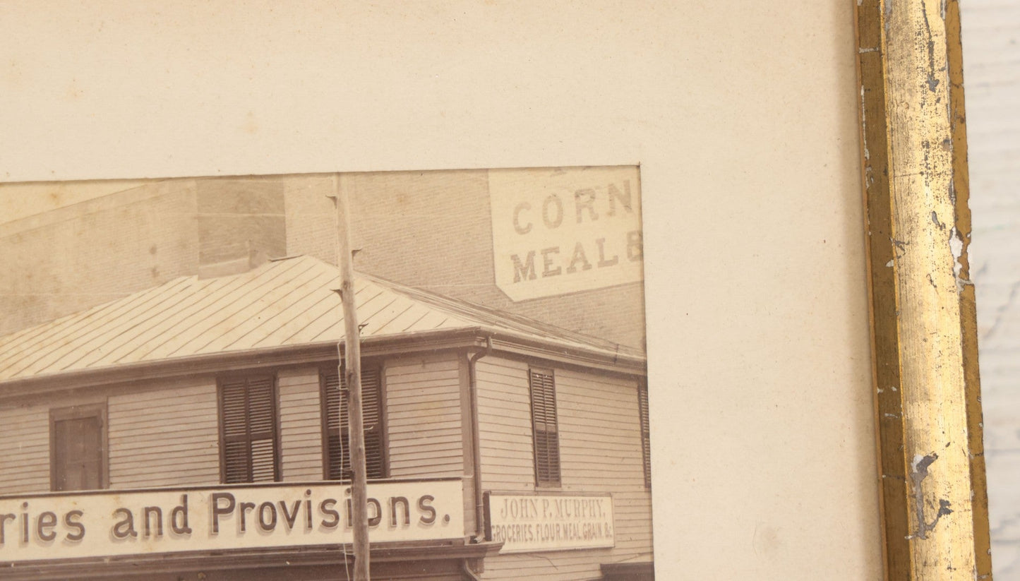 Lot 035 - Antique Occupational Photograph Depicting The Proprietors And Workers Of John P. Murphy Groceries And Provisions General Store, Located On West Main Street, Unknown City, Dog Visible In Photograph, In Period Frame, As Found, 11-1/2" x 8-1/2"
