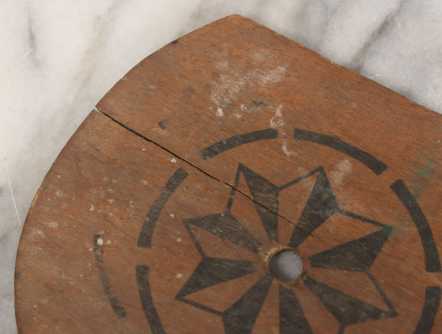 Lot 041 - Antique Wooden "Kiddy Bat" Game Paddle For Rubber Balls With Eight Pointed Star Geometric Design, Original Red Painted Handle, Note Vertical Crack At Top