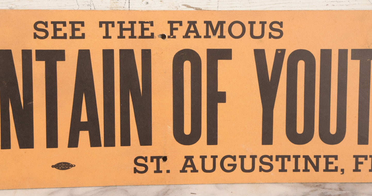 Lot 042 - Vintage Paper Board Travel Advertisement, "See The Famous Fountain Of Youth" St. Augustine, Florida, With Allied Printing Trades Council Union Bug Label, Note Six Perforated Mounting Holes, 22" x 7"
