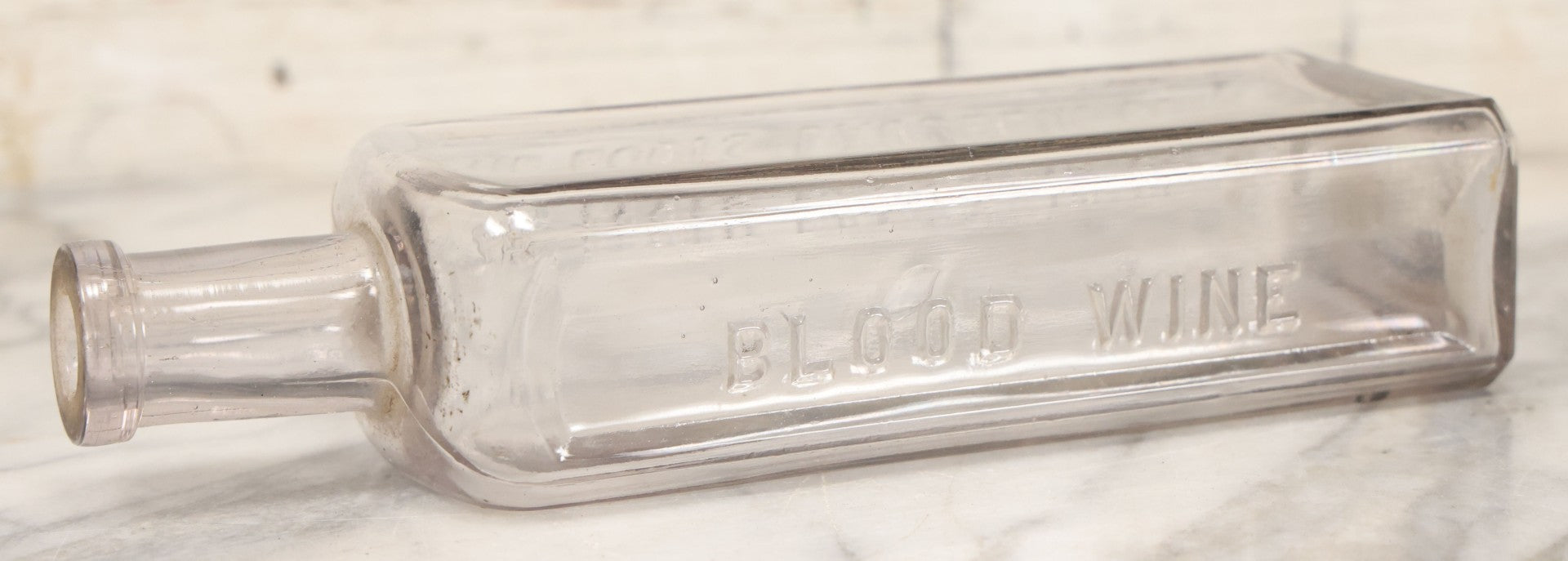 Lot 043 - Antique Blood Wine Patent Medicine Apothecary Glass Bottle By The Louis Daudelin Co., 8-1/2" Height