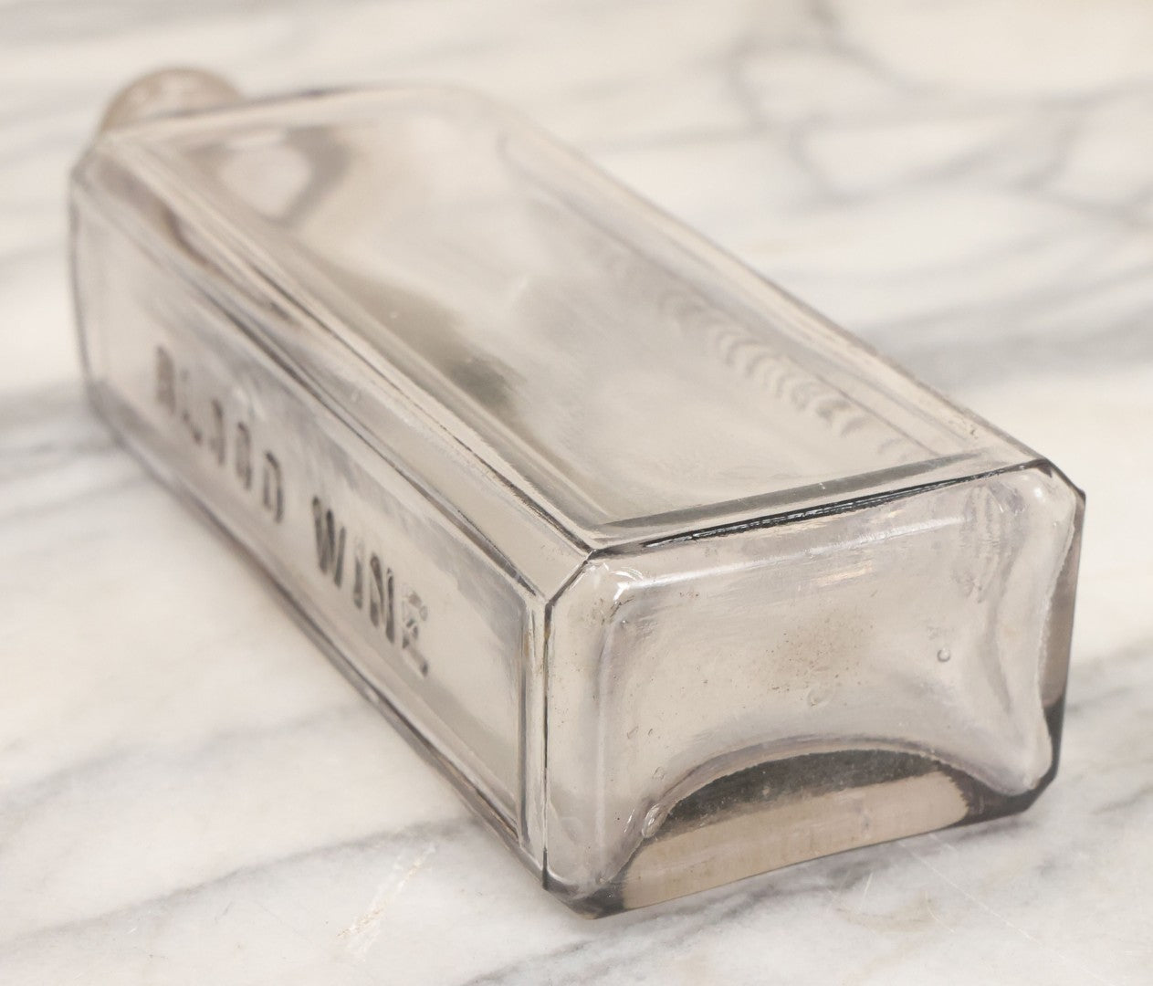 Lot 043 - Antique Blood Wine Patent Medicine Apothecary Glass Bottle By The Louis Daudelin Co., 8-1/2" Height