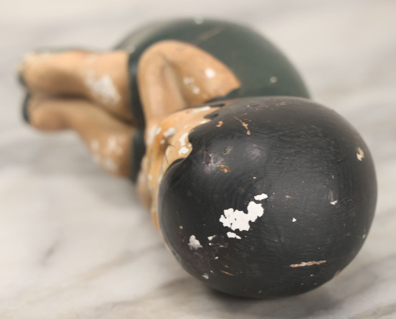 Lot 044 - Vintage Chalkware Kewpie-Style Crouching Flapper Doll With Black Hair And Green Dress, Back Marked "Splash Me", Note Paint Chipping And Wear, 4-3/4" Height