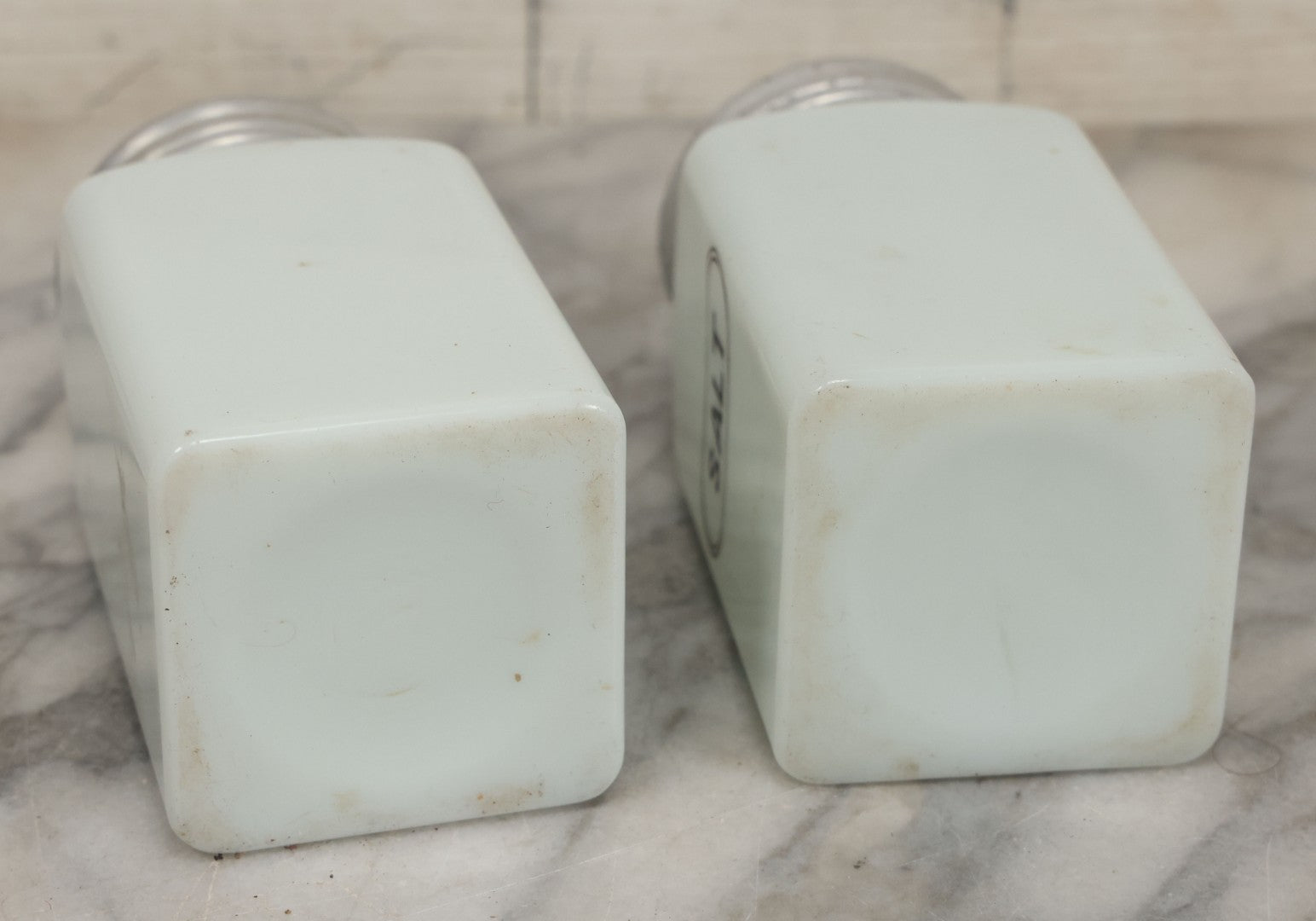 Lot 048 - Vintage Mid Century Milk Glass Salt And Pepper Shakers With Tin Lids And Black Lettering, 4-7/8" Height Each