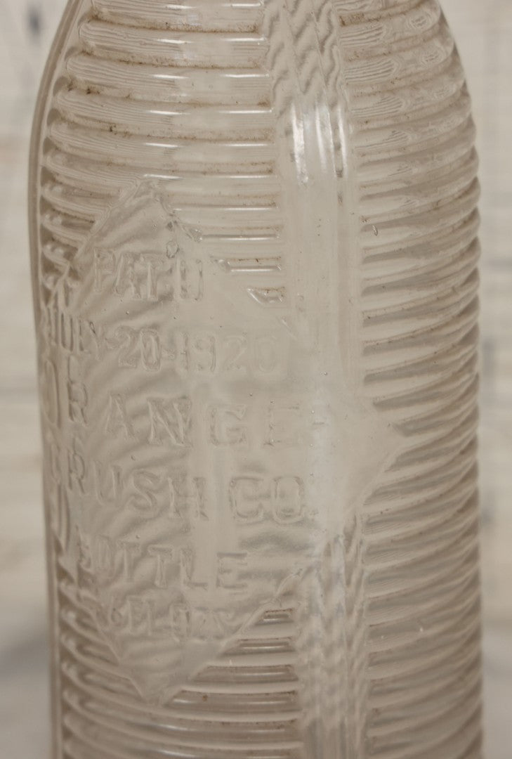 Lot 049 - Antique Clear Glass Orange-Crush Co. 26 Fluid Oz. Soda Bottle, Patented July 20, 1920, Bottle Manufactured By Cocheco, 11" Height