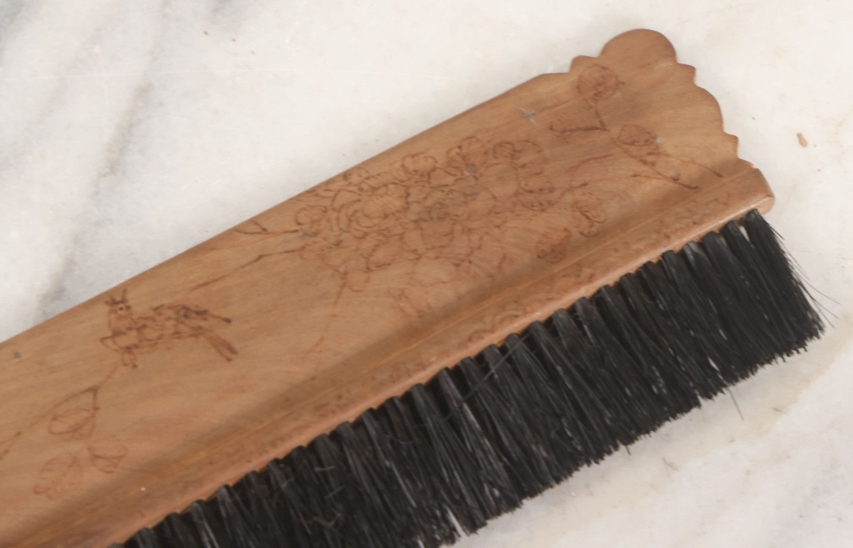 Lot 050 - Antique Folk Art Pyrography Wood Burned Wooden Handled Brush With Custom Decoration Of Young Man Holding A Large Goose, And A Bird On A Branch