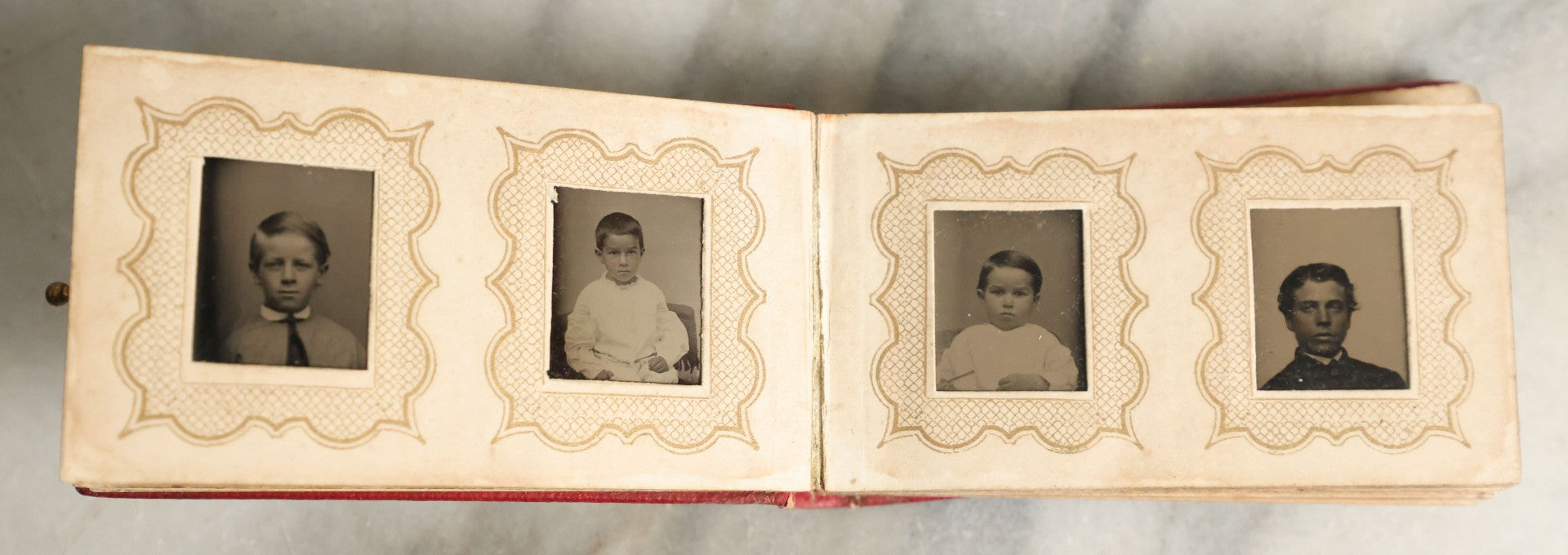 Lot 058 - Antique Gem Tintype Photo Album With 19 Tintype Photographs With Many Of Children Including Hidden Mother, Handwritten Note States "From The Colby Home On Colby Road"