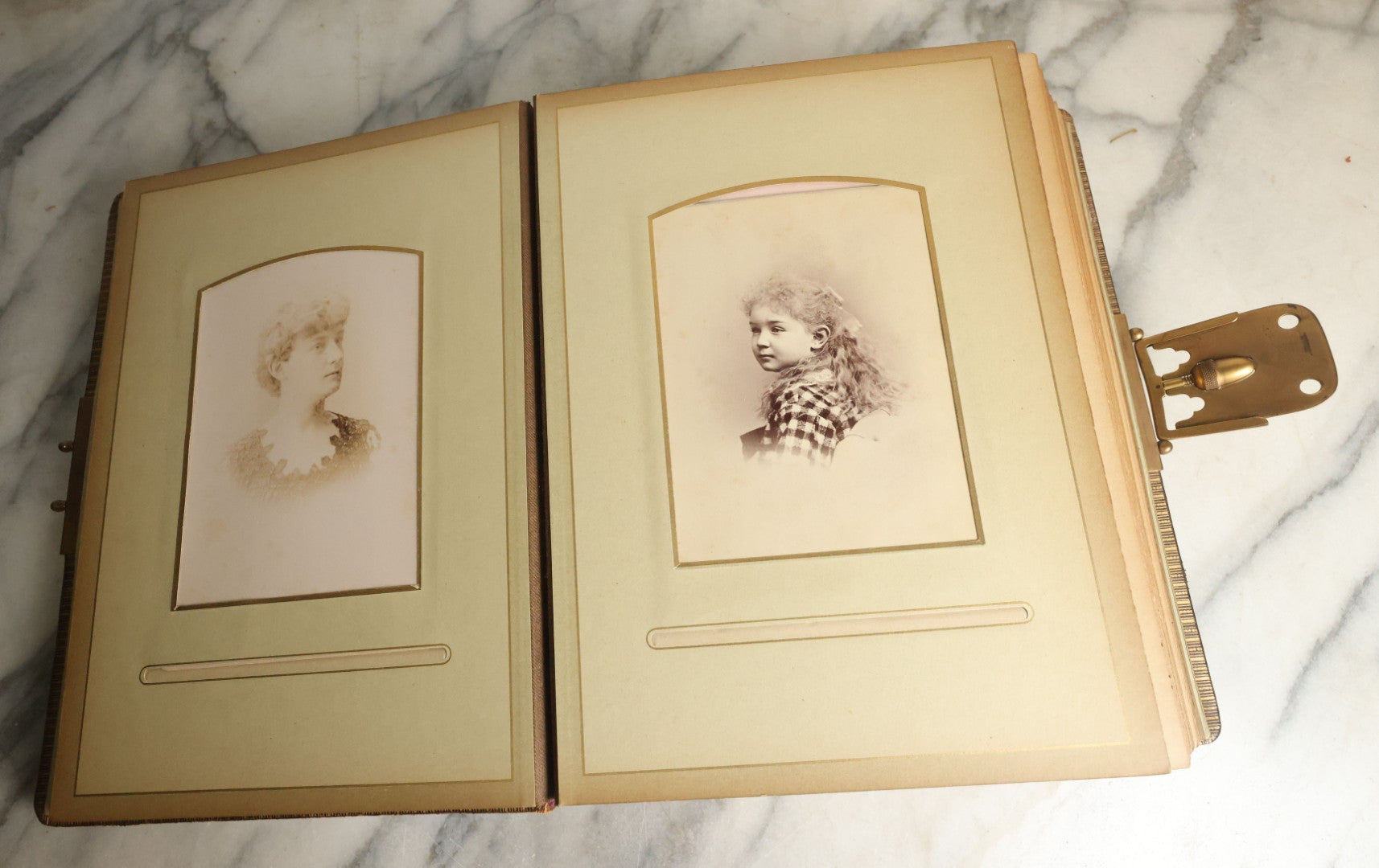 Lot 059 - Antique Photo And Keepsake Album With Cabinet Card, Tintype, And C.D.V. Photos, Remembrance Card & Hair From Mrs. Laura E. Little, Hidden Mother Tintype With Scratched Out Face, Photo Of Back Of Woman's Hair, Textile Keepsakes, Pressed Foliage