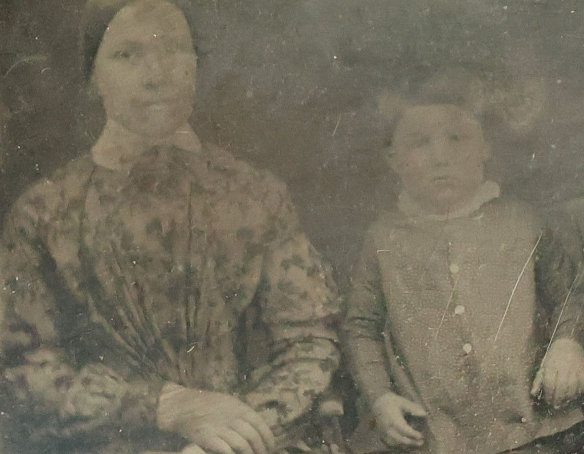 Lot 067 - Antique 1/6th Plate Daguerreotype Photograph Of Mother, Father, And Their Little Boy, Note Cleaning Marks On Photo. No Case.