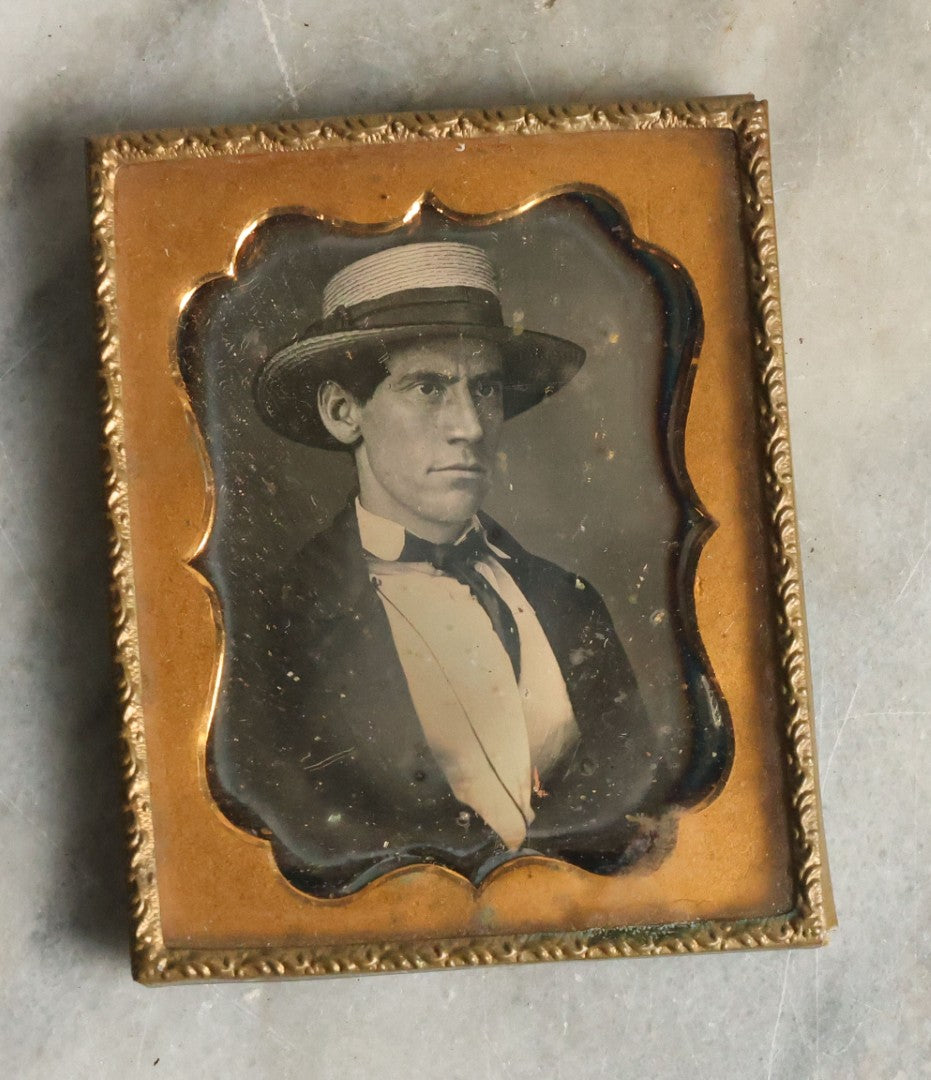 Lot 068 - Antique 1/9th Plate Daguerreotype Photograph Of Handsome Man With Furrowed Brow And Straw Boater Hat, No Case, Photo By Boston Picture Company, Tyler & Co.