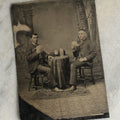 Lot 072 - Single Antique Tintype Photograph Of Two Young Men Playing Cards And Drinking With Bowler Hats On Small Table