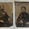 Lot 075 - Pair Of Tintype Photographs Of An Old Man With Large Hands And Unusual Face And Big Bushy Beard, And Stern Woman With Large Neck Bow