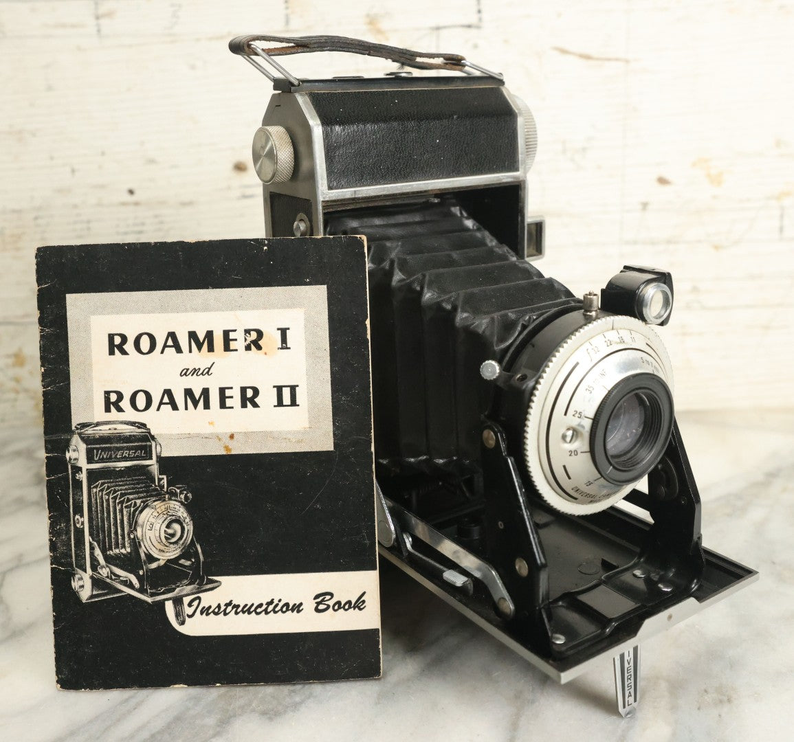 Lot 076 - Antique Universal Camera Corporation Roamer Folding Camera, With Instruction Booklet, Made In U.S.A.