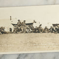Lot 092 - Antique Real Photo Postcard R.P.P.C. Of Group Of Cowboys, Captioned "Dinner On A Roundup, Western Canada Ranching Series," Copyright 1912, By A.E. Brown