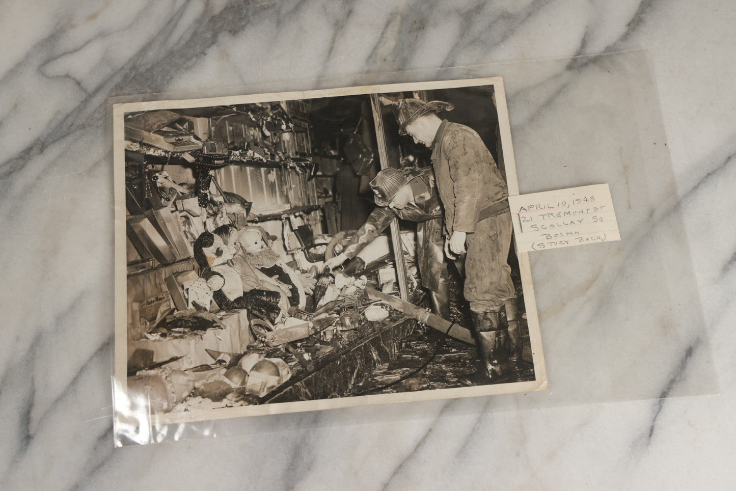Lot 001 - Extensive Grouping Of 100+ Documentary Press Photos Of Firefighters Battling Fires, Aftermath And Destruction, And Firefighting Apperatus, In And Around The City Of Boston, Late 1930s To 1950s, With Notes Regarding Date And Location, 9" x 7"