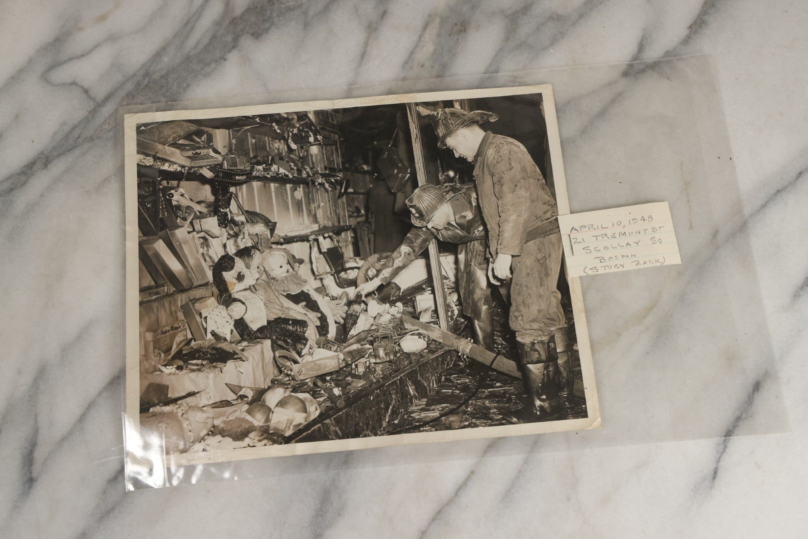 Lot 001 - Extensive Grouping Of 100+ Documentary Press Photos Of Firefighters Battling Fires, Aftermath And Destruction, And Firefighting Apperatus, In And Around The City Of Boston, Late 1930s To 1950s, With Notes Regarding Date And Location, 9" x 7"