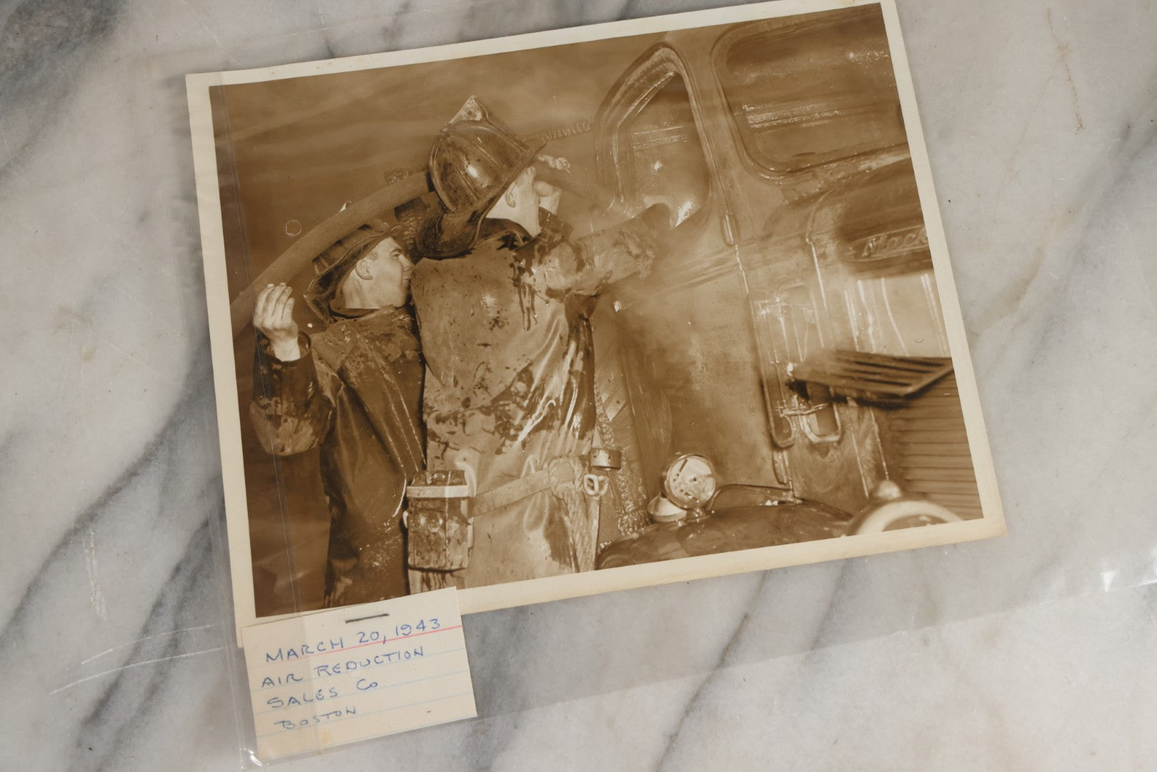 Lot 001 - Extensive Grouping Of 100+ Documentary Press Photos Of Firefighters Battling Fires, Aftermath And Destruction, And Firefighting Apperatus, In And Around The City Of Boston, Late 1930s To 1950s, With Notes Regarding Date And Location, 9" x 7"