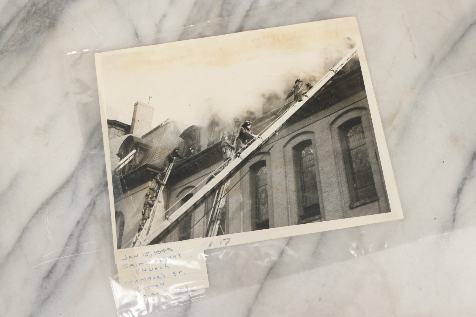 Lot 001 - Extensive Grouping Of 100+ Documentary Press Photos Of Firefighters Battling Fires, Aftermath And Destruction, And Firefighting Apperatus, In And Around The City Of Boston, Late 1930s To 1950s, With Notes Regarding Date And Location, 9" x 7"