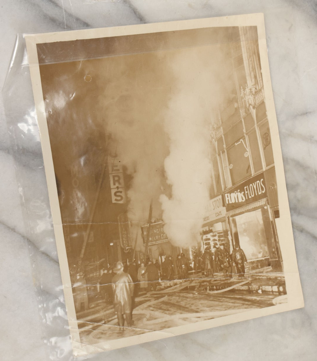 Lot 001 - Extensive Grouping Of 100+ Documentary Press Photos Of Firefighters Battling Fires, Aftermath And Destruction, And Firefighting Apperatus, In And Around The City Of Boston, Late 1930s To 1950s, With Notes Regarding Date And Location, 9" x 7"