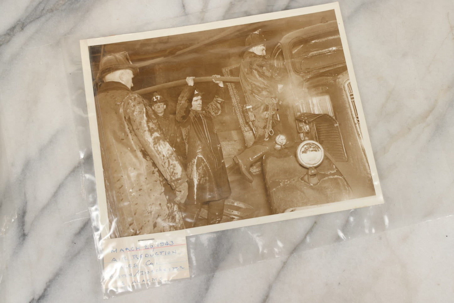 Lot 001 - Extensive Grouping Of 100+ Documentary Press Photos Of Firefighters Battling Fires, Aftermath And Destruction, And Firefighting Apperatus, In And Around The City Of Boston, Late 1930s To 1950s, With Notes Regarding Date And Location, 9" x 7"