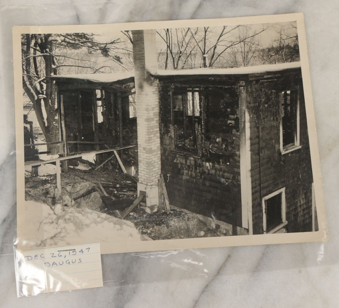 Lot 001 - Extensive Grouping Of 100+ Documentary Press Photos Of Firefighters Battling Fires, Aftermath And Destruction, And Firefighting Apperatus, In And Around The City Of Boston, Late 1930s To 1950s, With Notes Regarding Date And Location, 9" x 7"