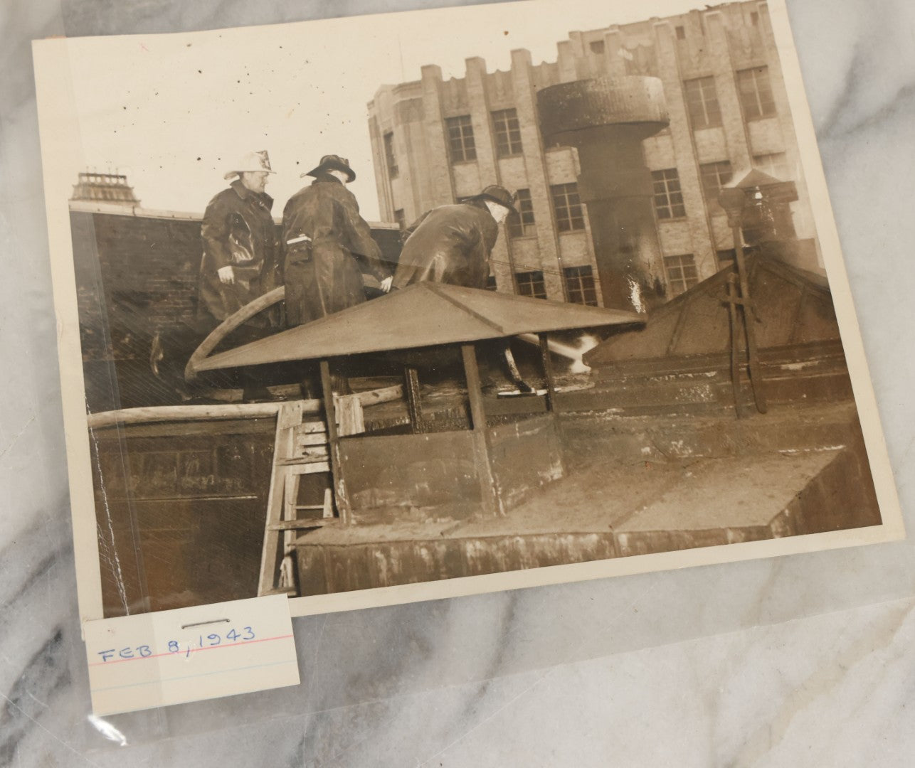 Lot 001 - Extensive Grouping Of 100+ Documentary Press Photos Of Firefighters Battling Fires, Aftermath And Destruction, And Firefighting Apperatus, In And Around The City Of Boston, Late 1930s To 1950s, With Notes Regarding Date And Location, 9" x 7"