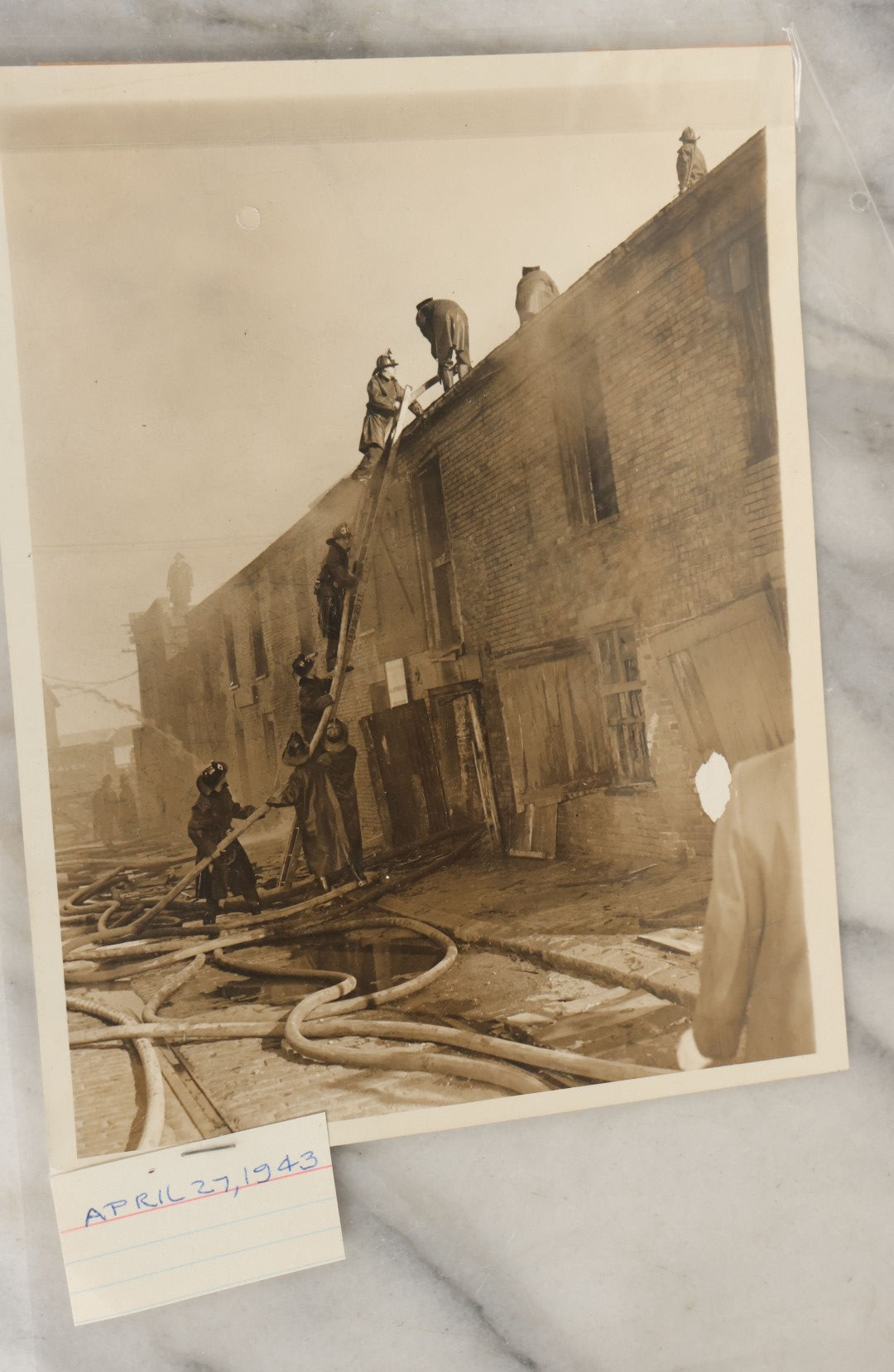 Lot 001 - Extensive Grouping Of 100+ Documentary Press Photos Of Firefighters Battling Fires, Aftermath And Destruction, And Firefighting Apperatus, In And Around The City Of Boston, Late 1930s To 1950s, With Notes Regarding Date And Location, 9" x 7"