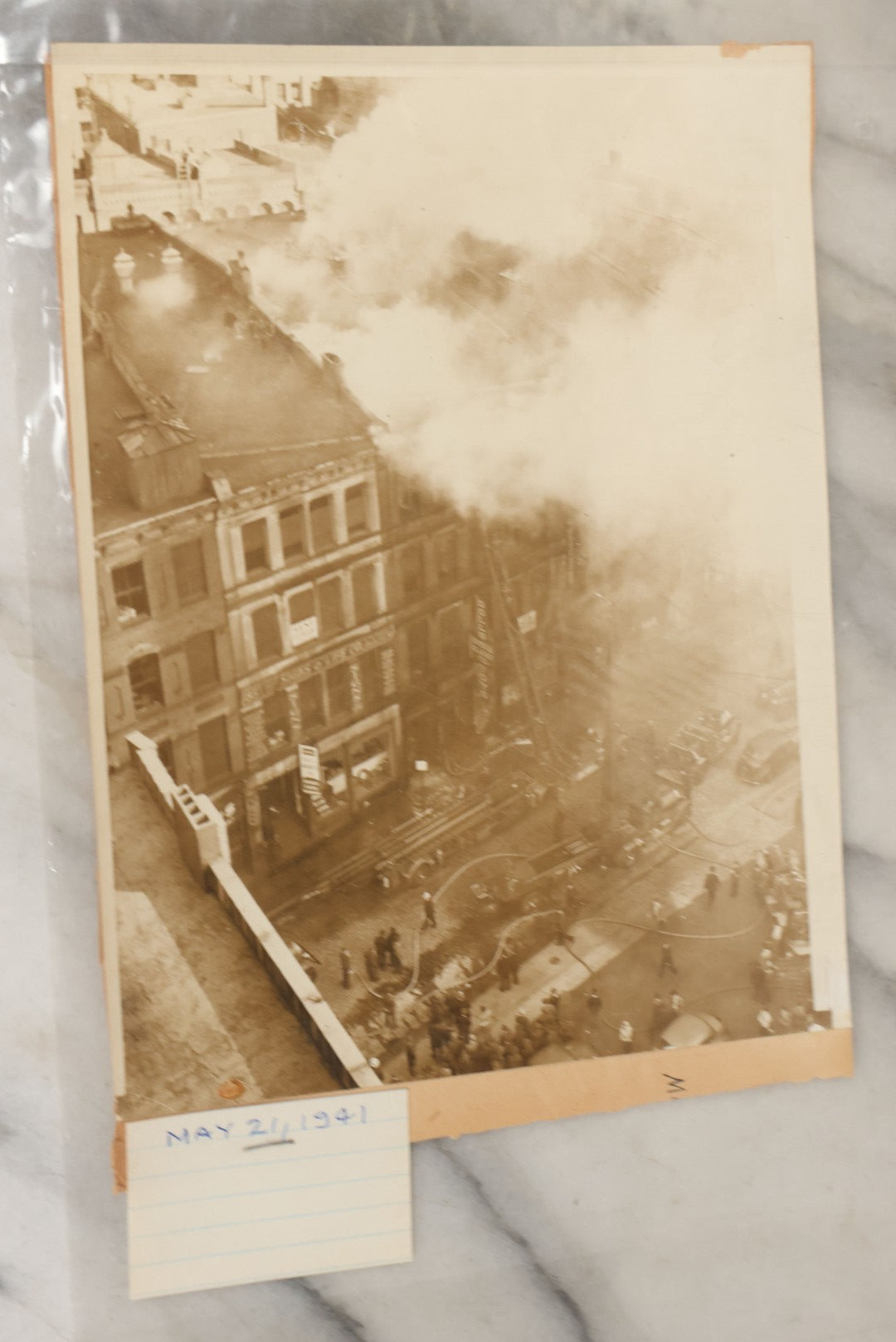 Lot 001 - Extensive Grouping Of 100+ Documentary Press Photos Of Firefighters Battling Fires, Aftermath And Destruction, And Firefighting Apperatus, In And Around The City Of Boston, Late 1930s To 1950s, With Notes Regarding Date And Location, 9" x 7"