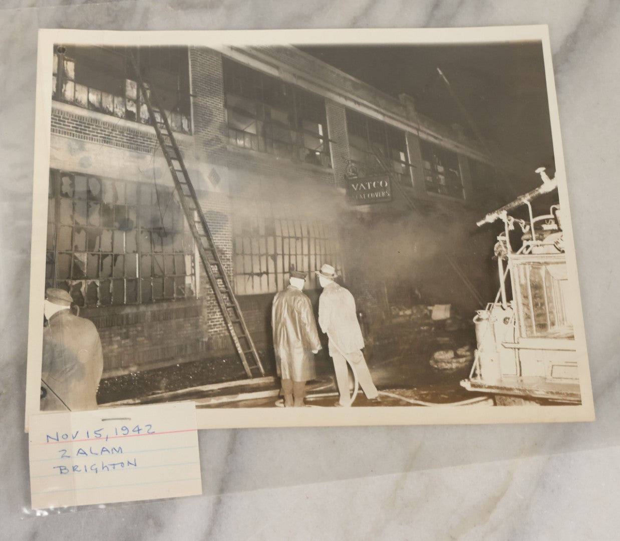 Lot 001 - Extensive Grouping Of 100+ Documentary Press Photos Of Firefighters Battling Fires, Aftermath And Destruction, And Firefighting Apperatus, In And Around The City Of Boston, Late 1930s To 1950s, With Notes Regarding Date And Location, 9" x 7"