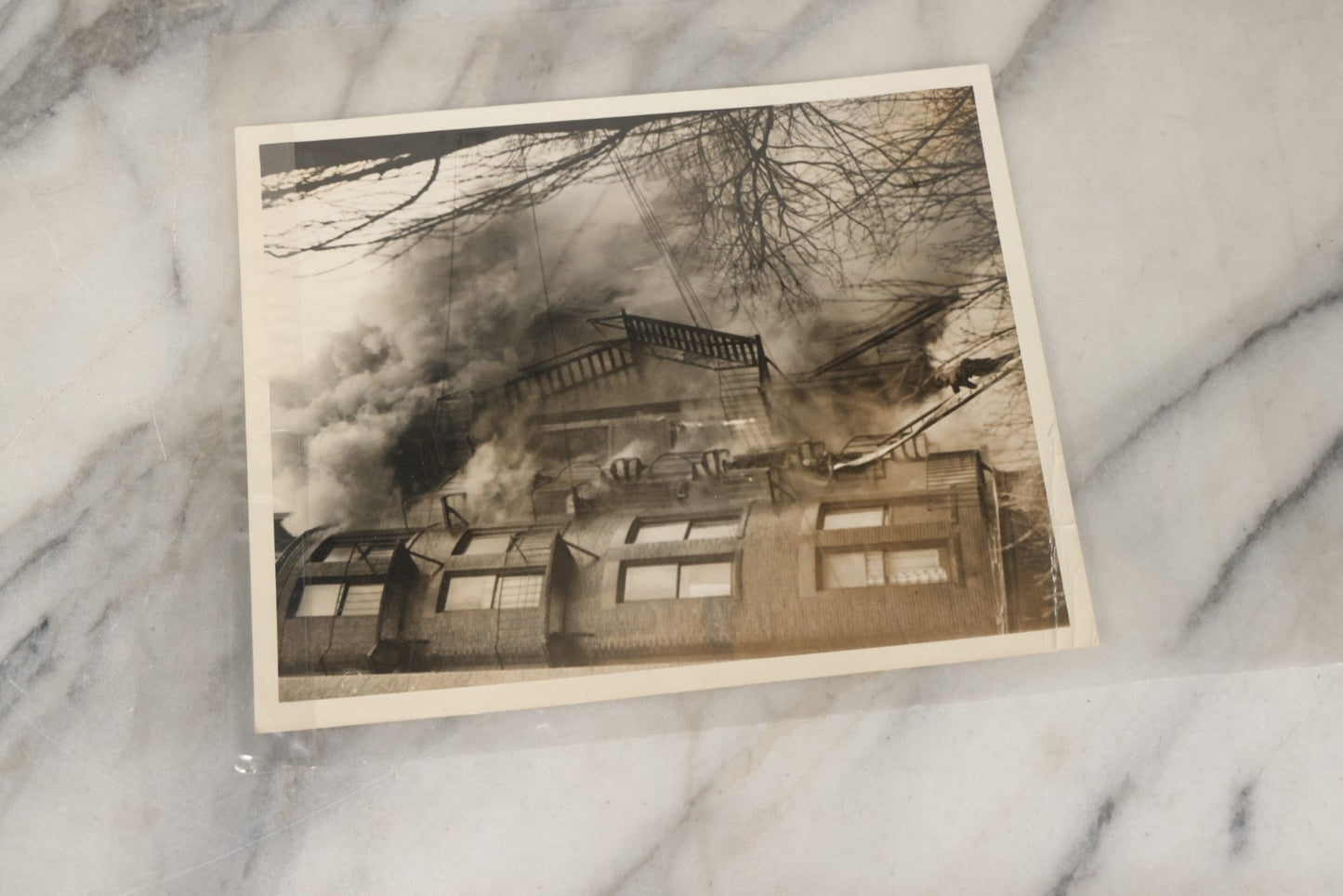 Lot 001 - Extensive Grouping Of 100+ Documentary Press Photos Of Firefighters Battling Fires, Aftermath And Destruction, And Firefighting Apperatus, In And Around The City Of Boston, Late 1930s To 1950s, With Notes Regarding Date And Location, 9" x 7"