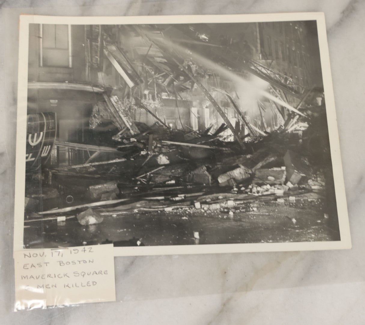 Lot 001 - Extensive Grouping Of 100+ Documentary Press Photos Of Firefighters Battling Fires, Aftermath And Destruction, And Firefighting Apperatus, In And Around The City Of Boston, Late 1930s To 1950s, With Notes Regarding Date And Location, 9" x 7"