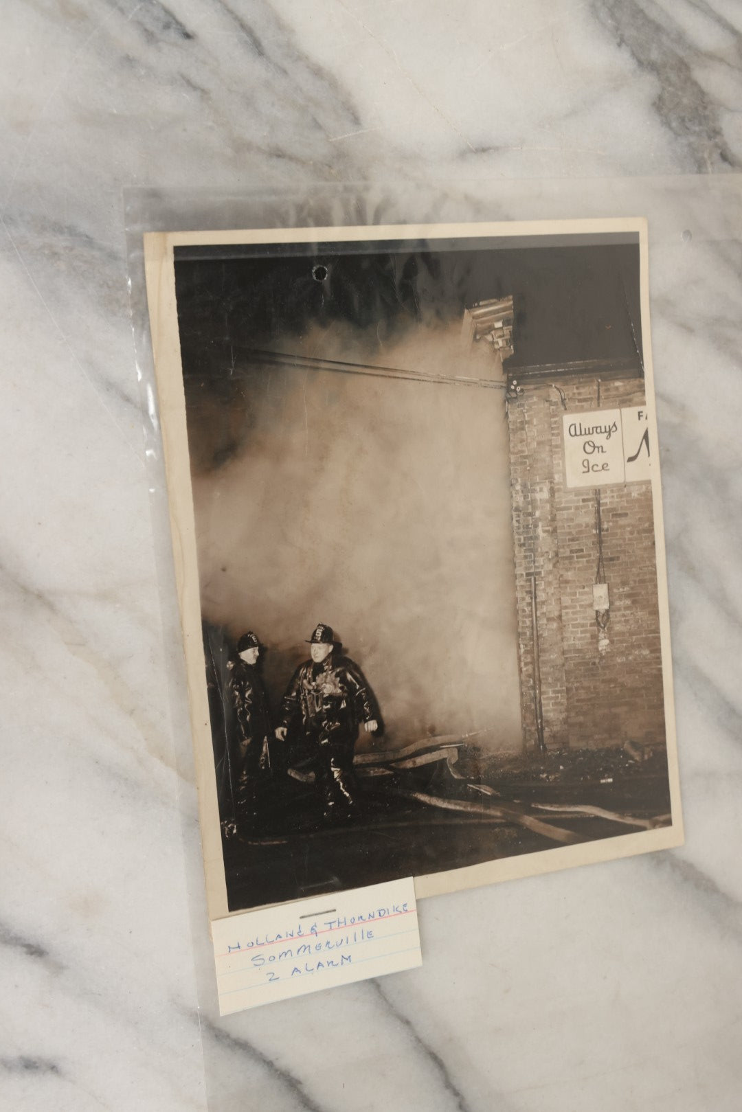 Lot 001 - Extensive Grouping Of 100+ Documentary Press Photos Of Firefighters Battling Fires, Aftermath And Destruction, And Firefighting Apperatus, In And Around The City Of Boston, Late 1930s To 1950s, With Notes Regarding Date And Location, 9" x 7"