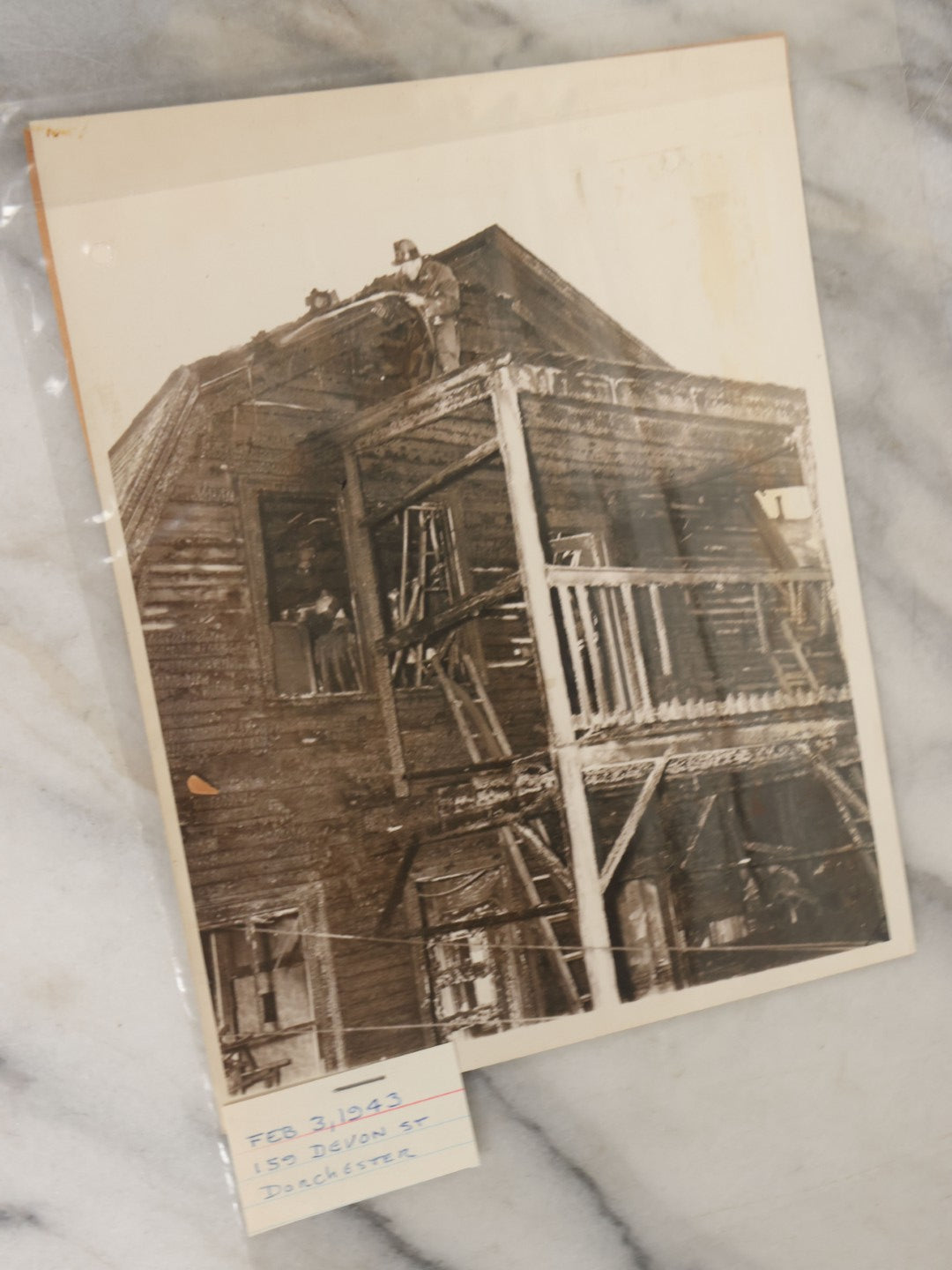 Lot 001 - Extensive Grouping Of 100+ Documentary Press Photos Of Firefighters Battling Fires, Aftermath And Destruction, And Firefighting Apperatus, In And Around The City Of Boston, Late 1930s To 1950s, With Notes Regarding Date And Location, 9" x 7"