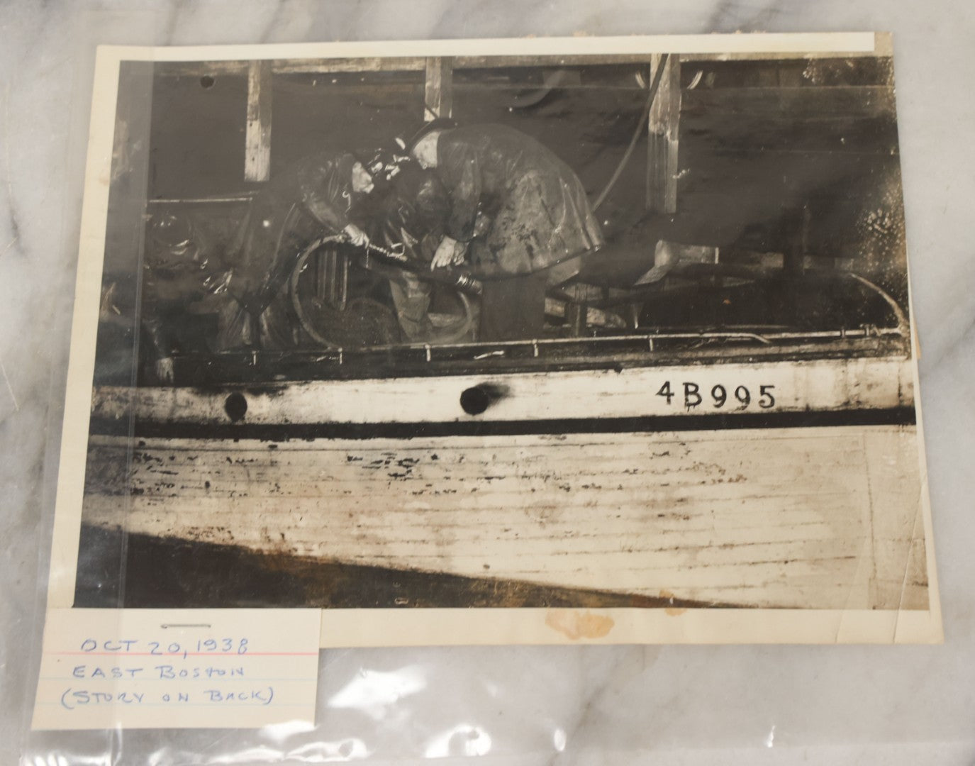 Lot 001 - Extensive Grouping Of 100+ Documentary Press Photos Of Firefighters Battling Fires, Aftermath And Destruction, And Firefighting Apperatus, In And Around The City Of Boston, Late 1930s To 1950s, With Notes Regarding Date And Location, 9" x 7"