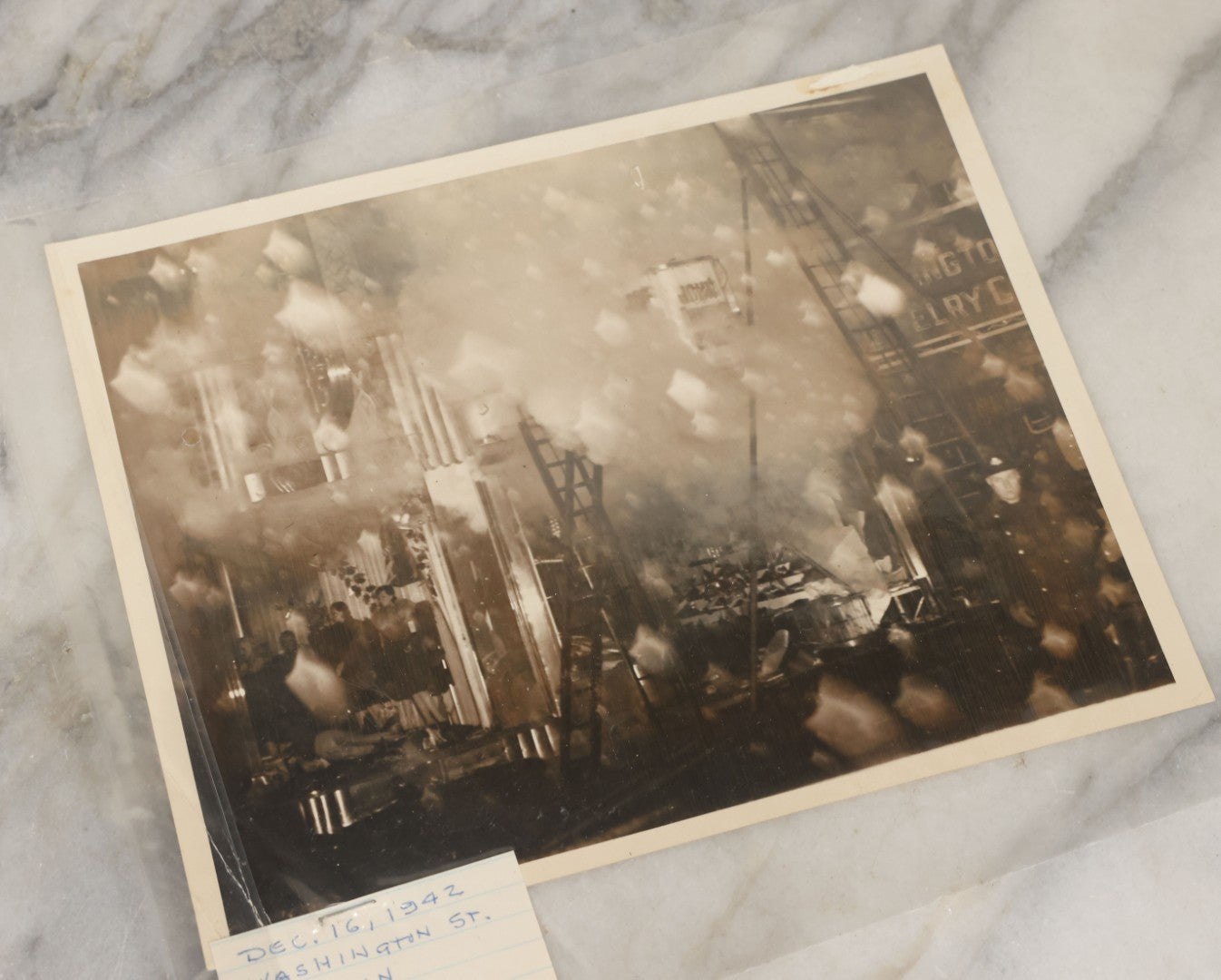 Lot 001 - Extensive Grouping Of 100+ Documentary Press Photos Of Firefighters Battling Fires, Aftermath And Destruction, And Firefighting Apperatus, In And Around The City Of Boston, Late 1930s To 1950s, With Notes Regarding Date And Location, 9" x 7"
