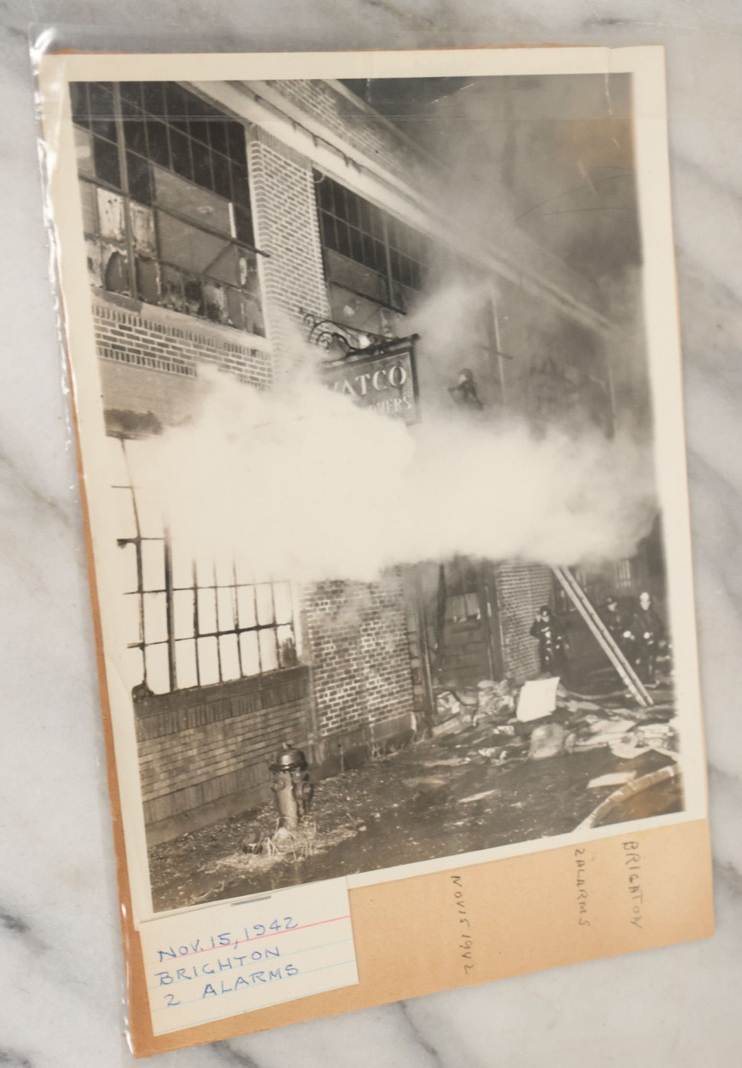 Lot 001 - Extensive Grouping Of 100+ Documentary Press Photos Of Firefighters Battling Fires, Aftermath And Destruction, And Firefighting Apperatus, In And Around The City Of Boston, Late 1930s To 1950s, With Notes Regarding Date And Location, 9" x 7"