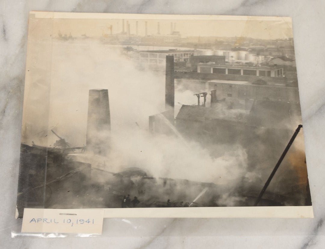 Lot 001 - Extensive Grouping Of 100+ Documentary Press Photos Of Firefighters Battling Fires, Aftermath And Destruction, And Firefighting Apperatus, In And Around The City Of Boston, Late 1930s To 1950s, With Notes Regarding Date And Location, 9" x 7"