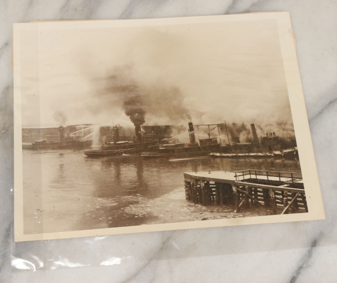 Lot 001 - Extensive Grouping Of 100+ Documentary Press Photos Of Firefighters Battling Fires, Aftermath And Destruction, And Firefighting Apperatus, In And Around The City Of Boston, Late 1930s To 1950s, With Notes Regarding Date And Location, 9" x 7"