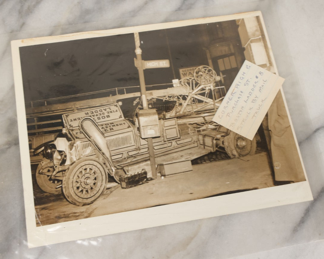 Lot 001 - Extensive Grouping Of 100+ Documentary Press Photos Of Firefighters Battling Fires, Aftermath And Destruction, And Firefighting Apperatus, In And Around The City Of Boston, Late 1930s To 1950s, With Notes Regarding Date And Location, 9" x 7"