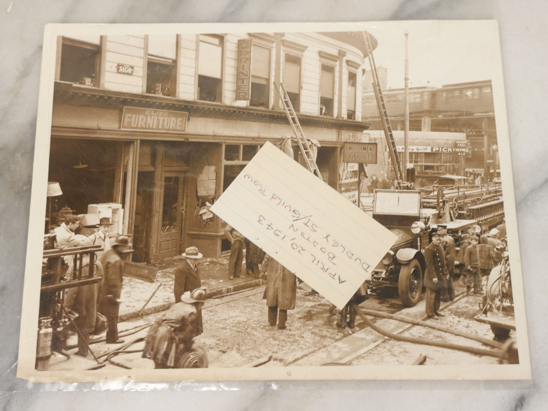 Lot 001 - Extensive Grouping Of 100+ Documentary Press Photos Of Firefighters Battling Fires, Aftermath And Destruction, And Firefighting Apperatus, In And Around The City Of Boston, Late 1930s To 1950s, With Notes Regarding Date And Location, 9" x 7"