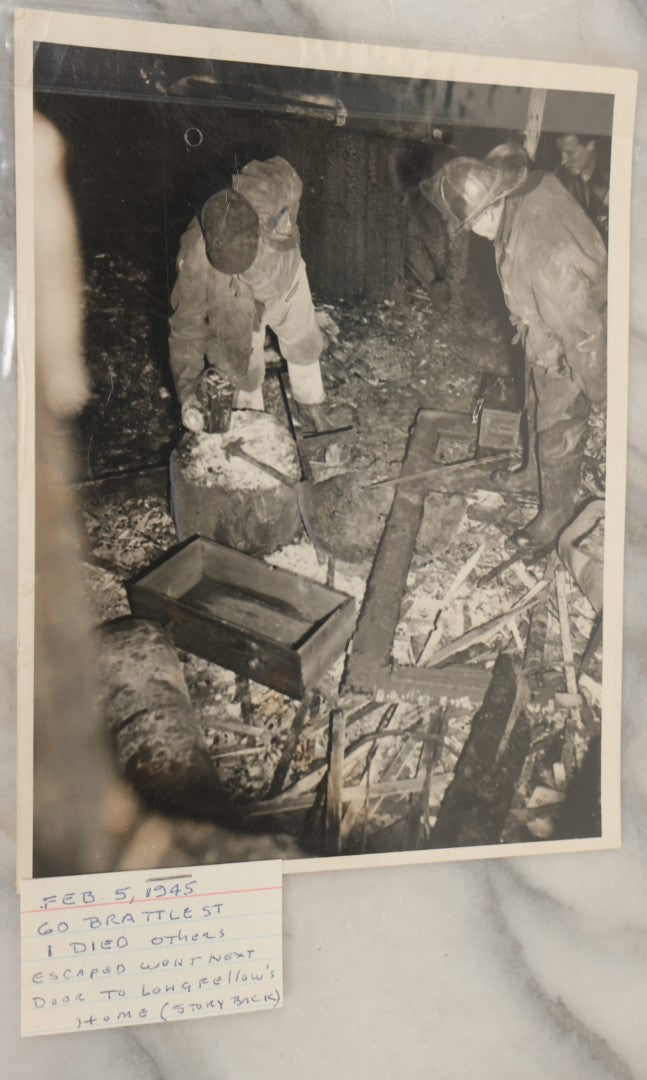 Lot 001 - Extensive Grouping Of 100+ Documentary Press Photos Of Firefighters Battling Fires, Aftermath And Destruction, And Firefighting Apperatus, In And Around The City Of Boston, Late 1930s To 1950s, With Notes Regarding Date And Location, 9" x 7"