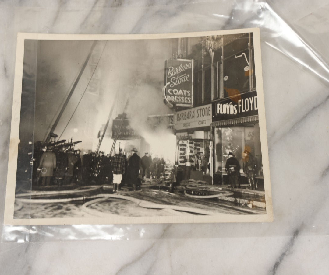 Lot 001 - Extensive Grouping Of 100+ Documentary Press Photos Of Firefighters Battling Fires, Aftermath And Destruction, And Firefighting Apperatus, In And Around The City Of Boston, Late 1930s To 1950s, With Notes Regarding Date And Location, 9" x 7"