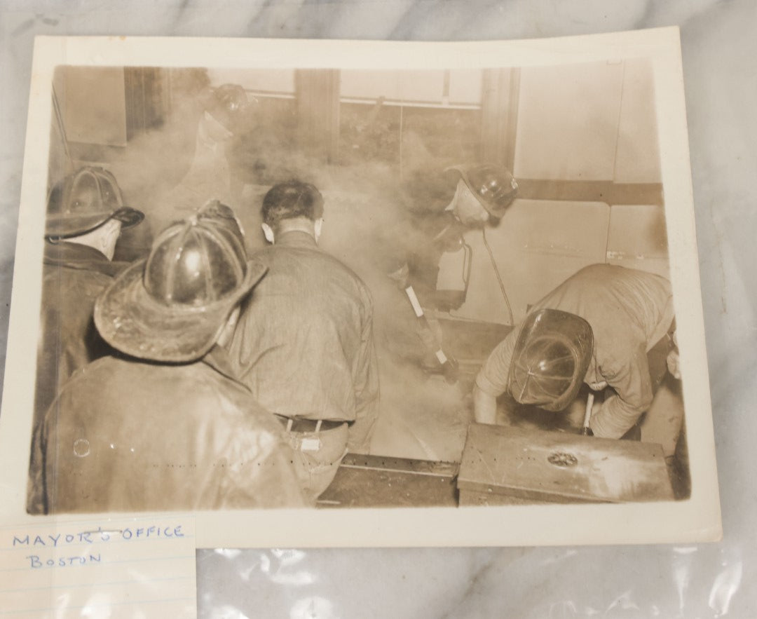 Lot 001 - Extensive Grouping Of 100+ Documentary Press Photos Of Firefighters Battling Fires, Aftermath And Destruction, And Firefighting Apperatus, In And Around The City Of Boston, Late 1930s To 1950s, With Notes Regarding Date And Location, 9" x 7"