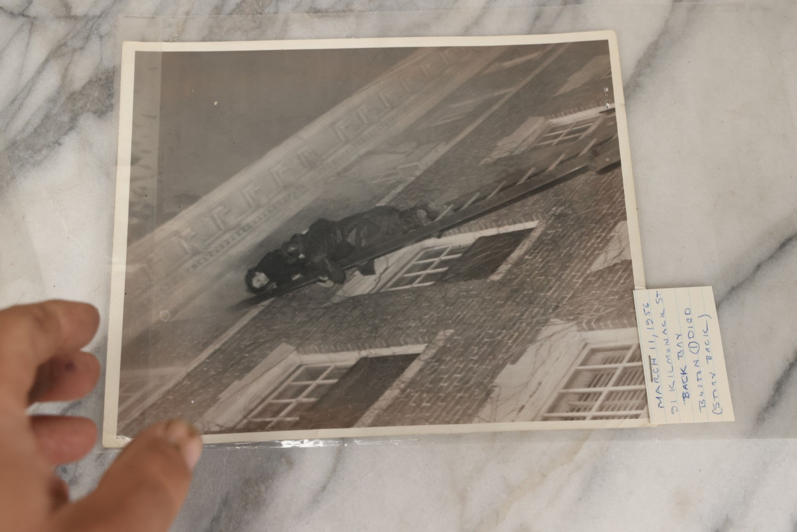 Lot 001 - Extensive Grouping Of 100+ Documentary Press Photos Of Firefighters Battling Fires, Aftermath And Destruction, And Firefighting Apperatus, In And Around The City Of Boston, Late 1930s To 1950s, With Notes Regarding Date And Location, 9" x 7"