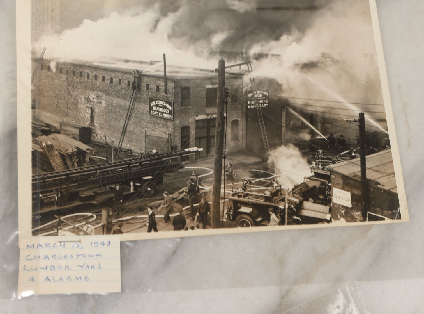 Lot 001 - Extensive Grouping Of 100+ Documentary Press Photos Of Firefighters Battling Fires, Aftermath And Destruction, And Firefighting Apperatus, In And Around The City Of Boston, Late 1930s To 1950s, With Notes Regarding Date And Location, 9" x 7"