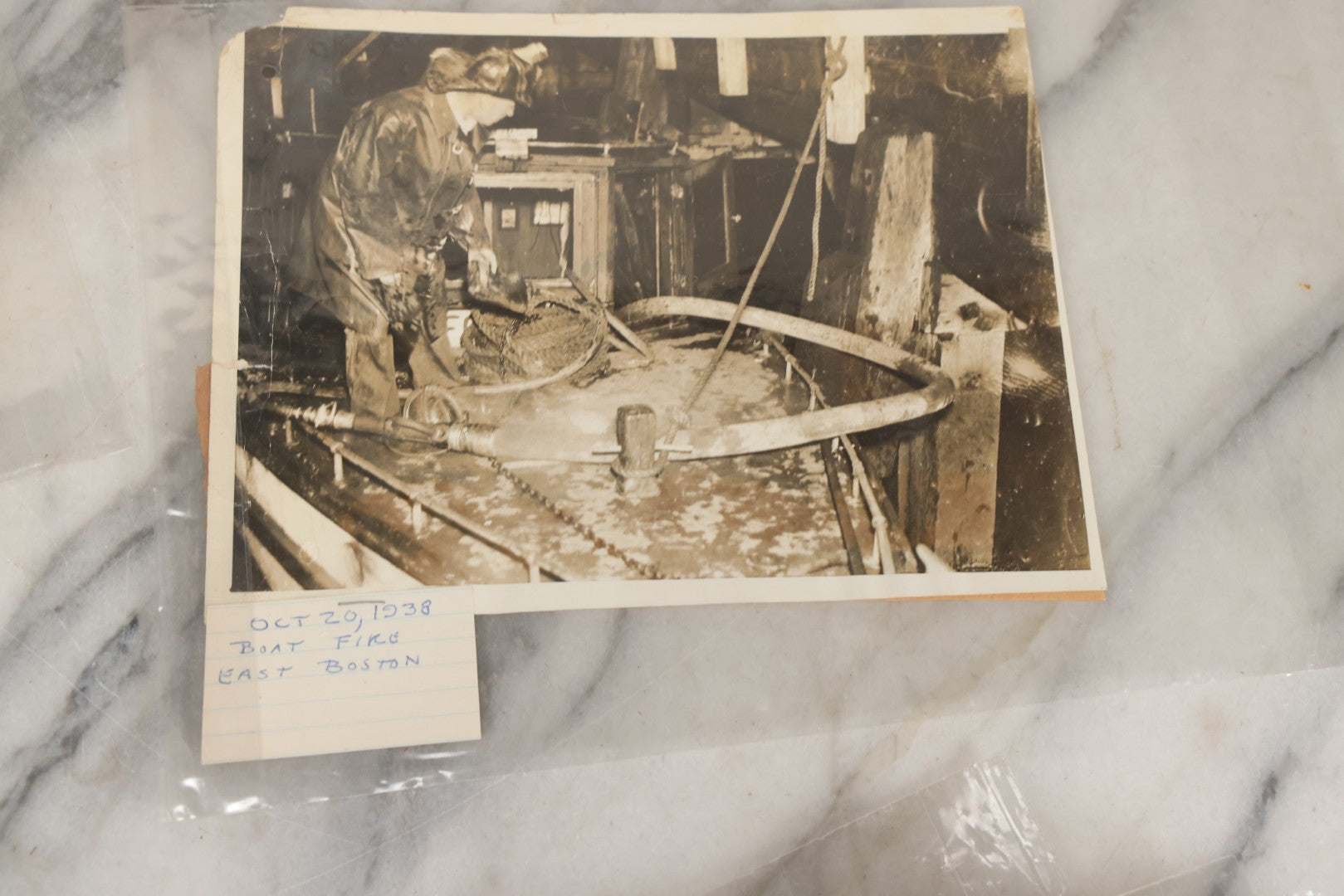 Lot 001 - Extensive Grouping Of 100+ Documentary Press Photos Of Firefighters Battling Fires, Aftermath And Destruction, And Firefighting Apperatus, In And Around The City Of Boston, Late 1930s To 1950s, With Notes Regarding Date And Location, 9" x 7"