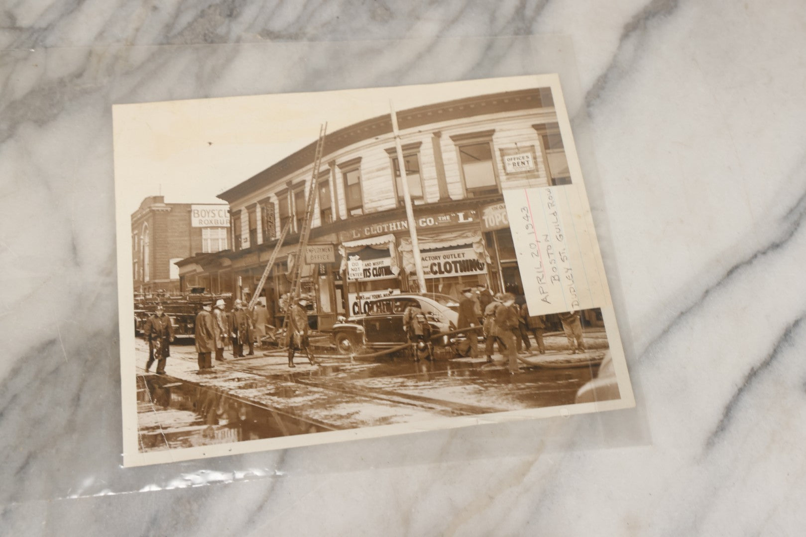 Lot 001 - Extensive Grouping Of 100+ Documentary Press Photos Of Firefighters Battling Fires, Aftermath And Destruction, And Firefighting Apperatus, In And Around The City Of Boston, Late 1930s To 1950s, With Notes Regarding Date And Location, 9" x 7"