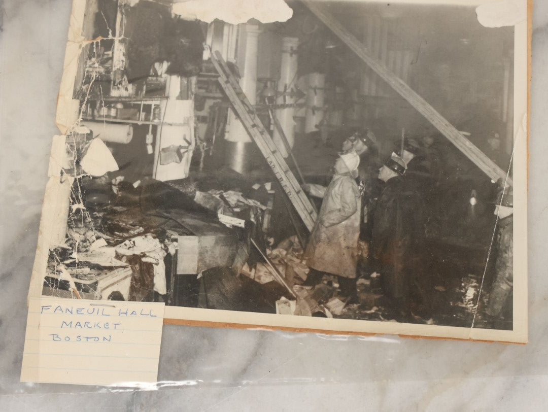 Lot 001 - Extensive Grouping Of 100+ Documentary Press Photos Of Firefighters Battling Fires, Aftermath And Destruction, And Firefighting Apperatus, In And Around The City Of Boston, Late 1930s To 1950s, With Notes Regarding Date And Location, 9" x 7"