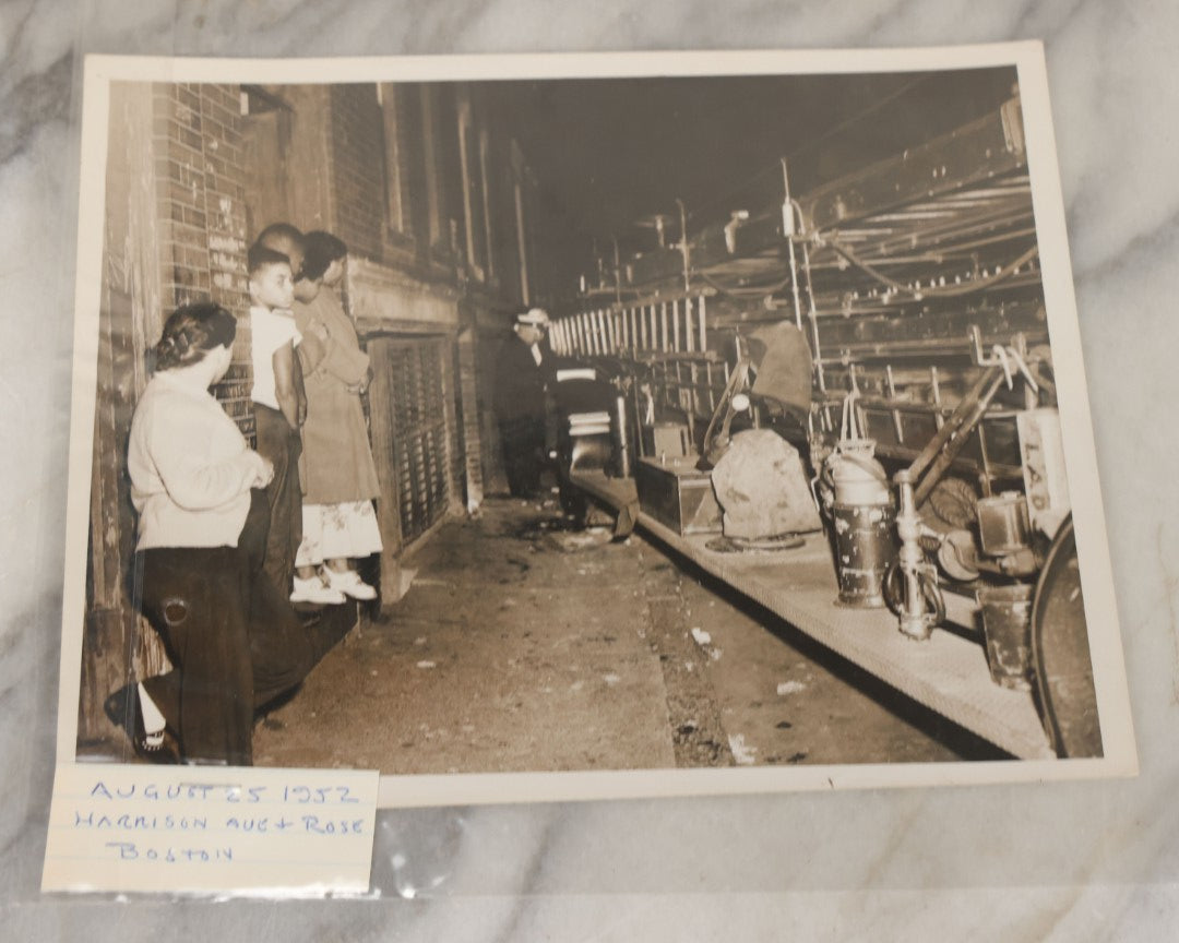 Lot 001 - Extensive Grouping Of 100+ Documentary Press Photos Of Firefighters Battling Fires, Aftermath And Destruction, And Firefighting Apperatus, In And Around The City Of Boston, Late 1930s To 1950s, With Notes Regarding Date And Location, 9" x 7"