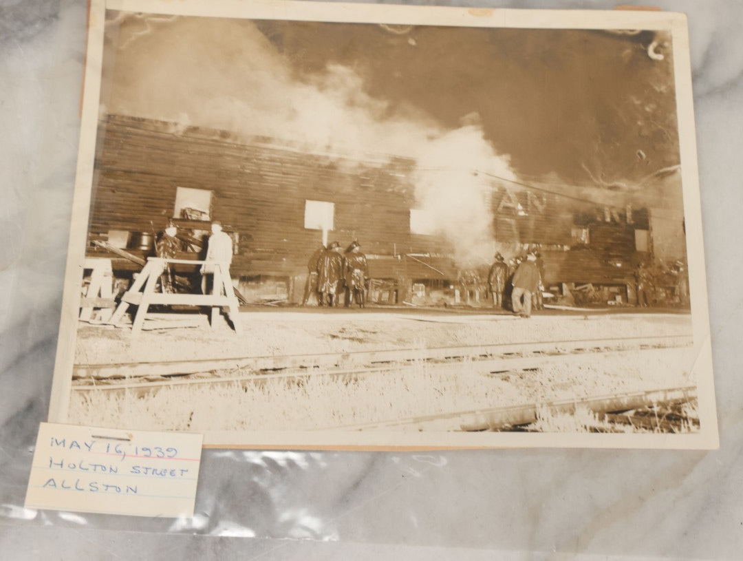 Lot 001 - Extensive Grouping Of 100+ Documentary Press Photos Of Firefighters Battling Fires, Aftermath And Destruction, And Firefighting Apperatus, In And Around The City Of Boston, Late 1930s To 1950s, With Notes Regarding Date And Location, 9" x 7"