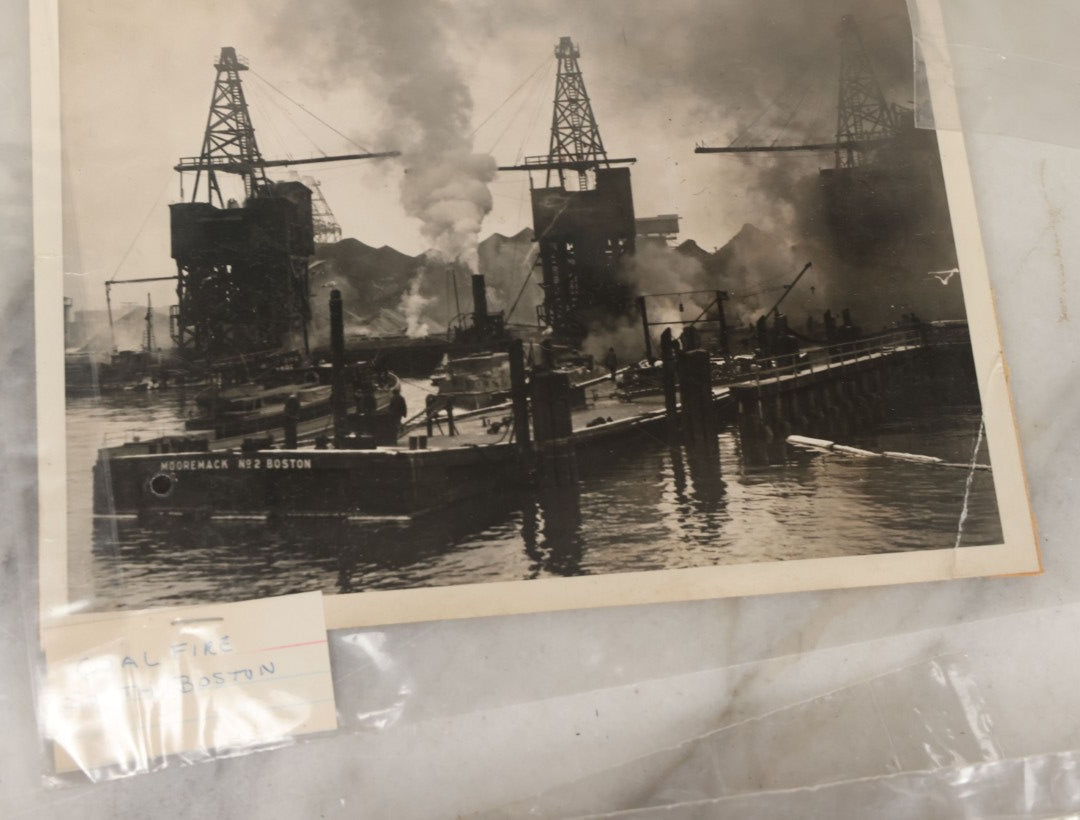 Lot 001 - Extensive Grouping Of 100+ Documentary Press Photos Of Firefighters Battling Fires, Aftermath And Destruction, And Firefighting Apperatus, In And Around The City Of Boston, Late 1930s To 1950s, With Notes Regarding Date And Location, 9" x 7"